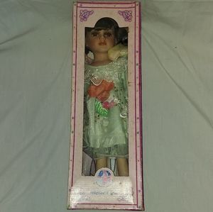 J. Misa collectable porcelain doll